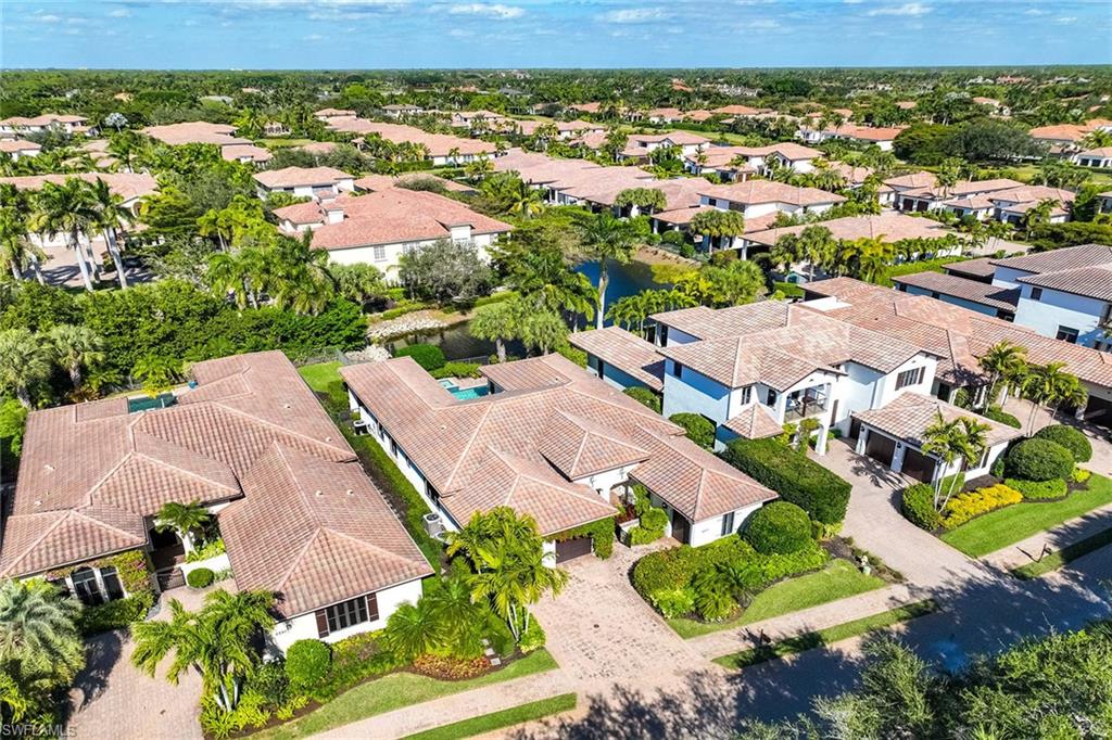 2277 Residence Circle Naples, FL 34105 - Photo 37 of 50 an aerial view of residential houses with outdoor space