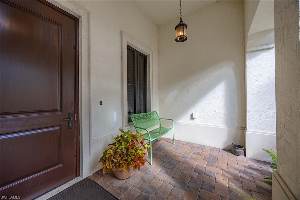 2277 Residence Circle Naples, FL 34105 - Photo 38 of 50 a bathroom with a tub and shower