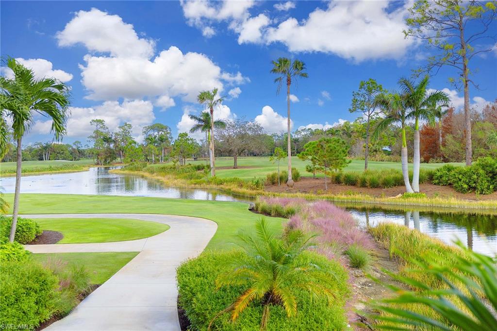 2277 Residence Circle Naples, FL 34105 - Photo 40 of 41 a view of a lake with a big yard