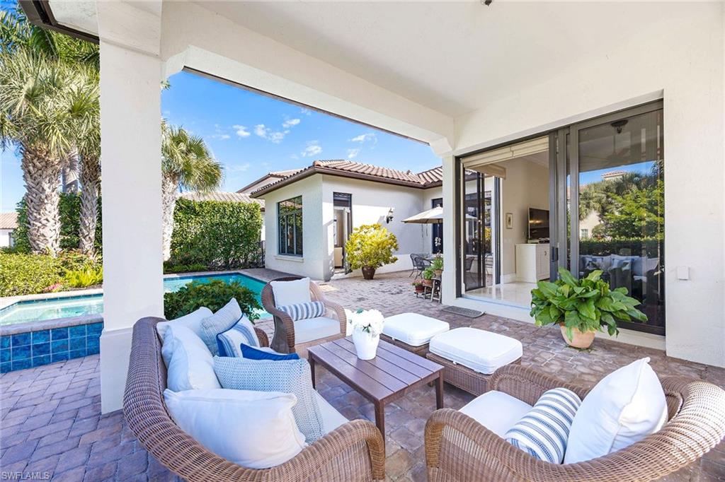 2277 Residence Circle Naples, FL 34105 - Photo 5 of 41 a view of a patio in the backyard