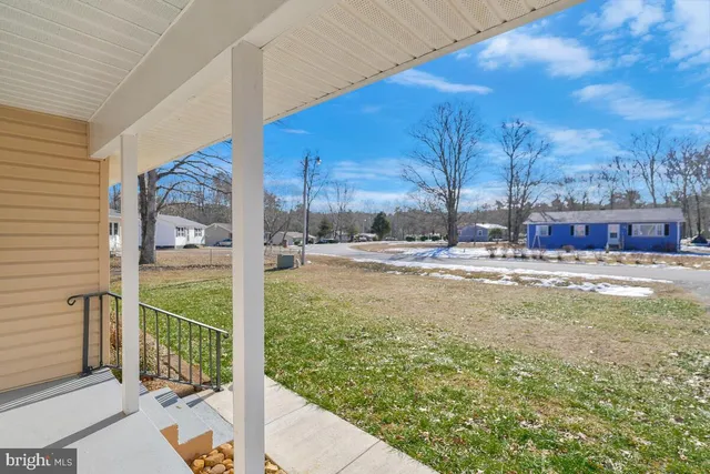 a view of small space with wooden floor