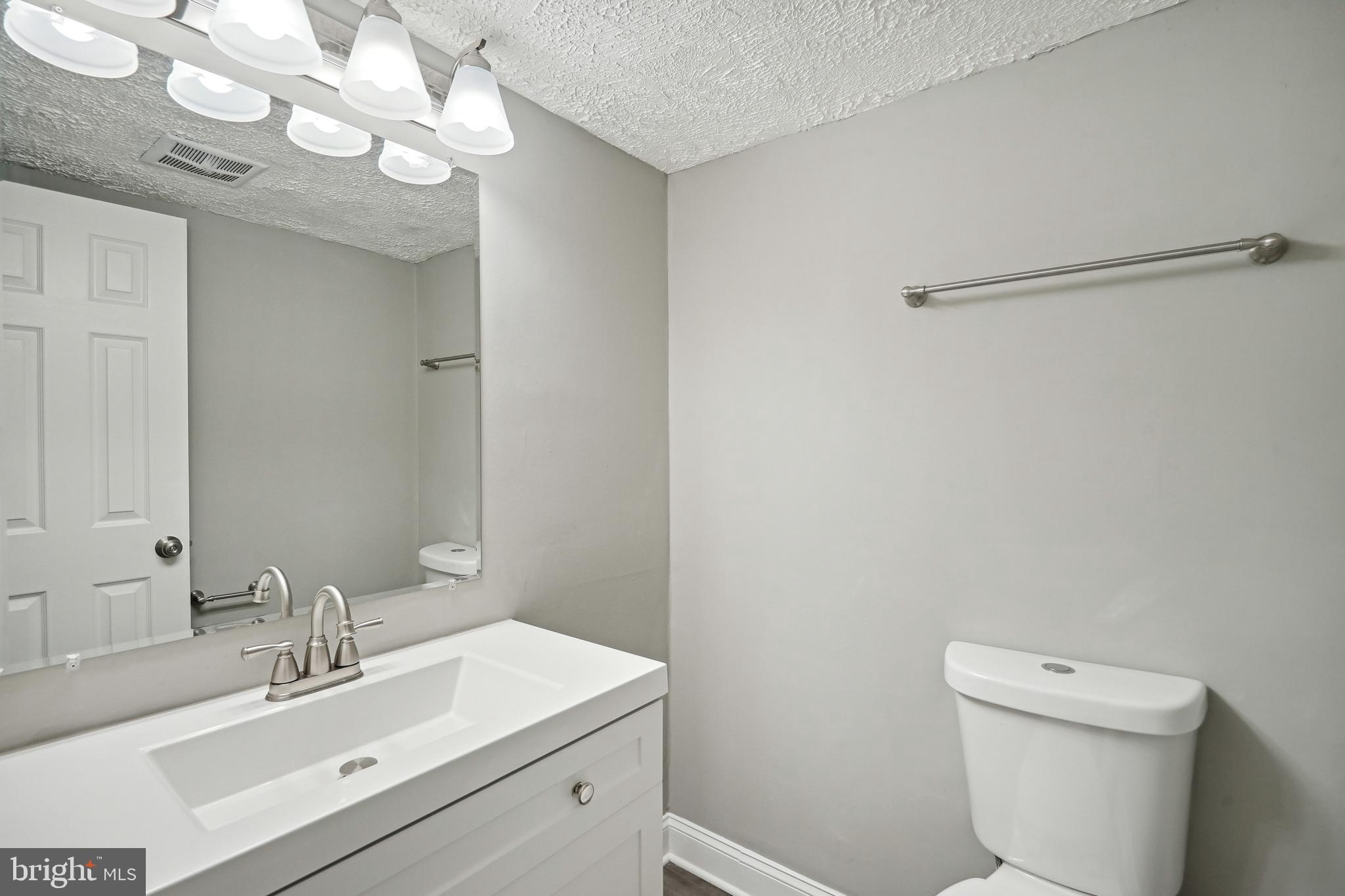 3356 Woodburn Road, Unit T2 Annandale, VA 22003 - Photo 15 of 20 Updated half bath attached to primary bedroom