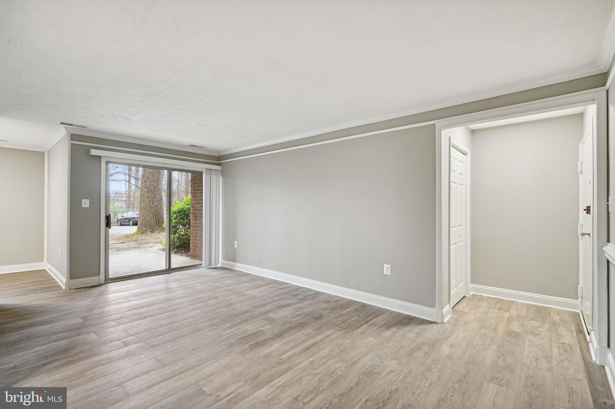3356 Woodburn Road, Unit T2 Annandale, VA 22003 - Photo 5 of 20 Living room with patio