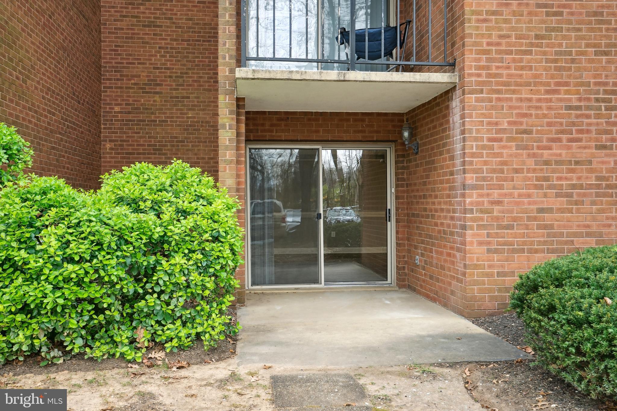3356 Woodburn Road, Unit T2 Annandale, VA 22003 - Photo 7 of 20 Patio entrance to unit