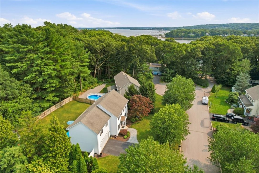 26 Davis Circle Warwick, RI 02886 - Photo 4 of 50 With glimpses of the nearby bay from the neighborhood and a location close to marinas, beaches, shopping, restaurants, and commuter routes, this home perfectly balances peaceful suburban living with everyday convenience.
