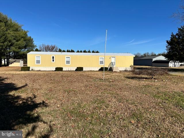a view of a road with a building in the background