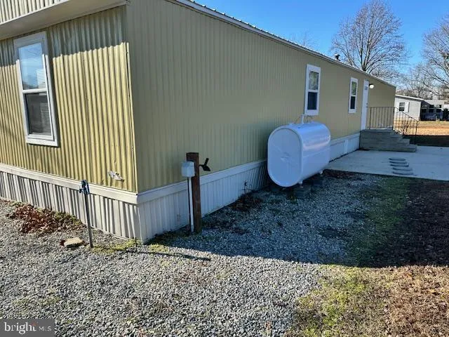 a view of a backyard of the house