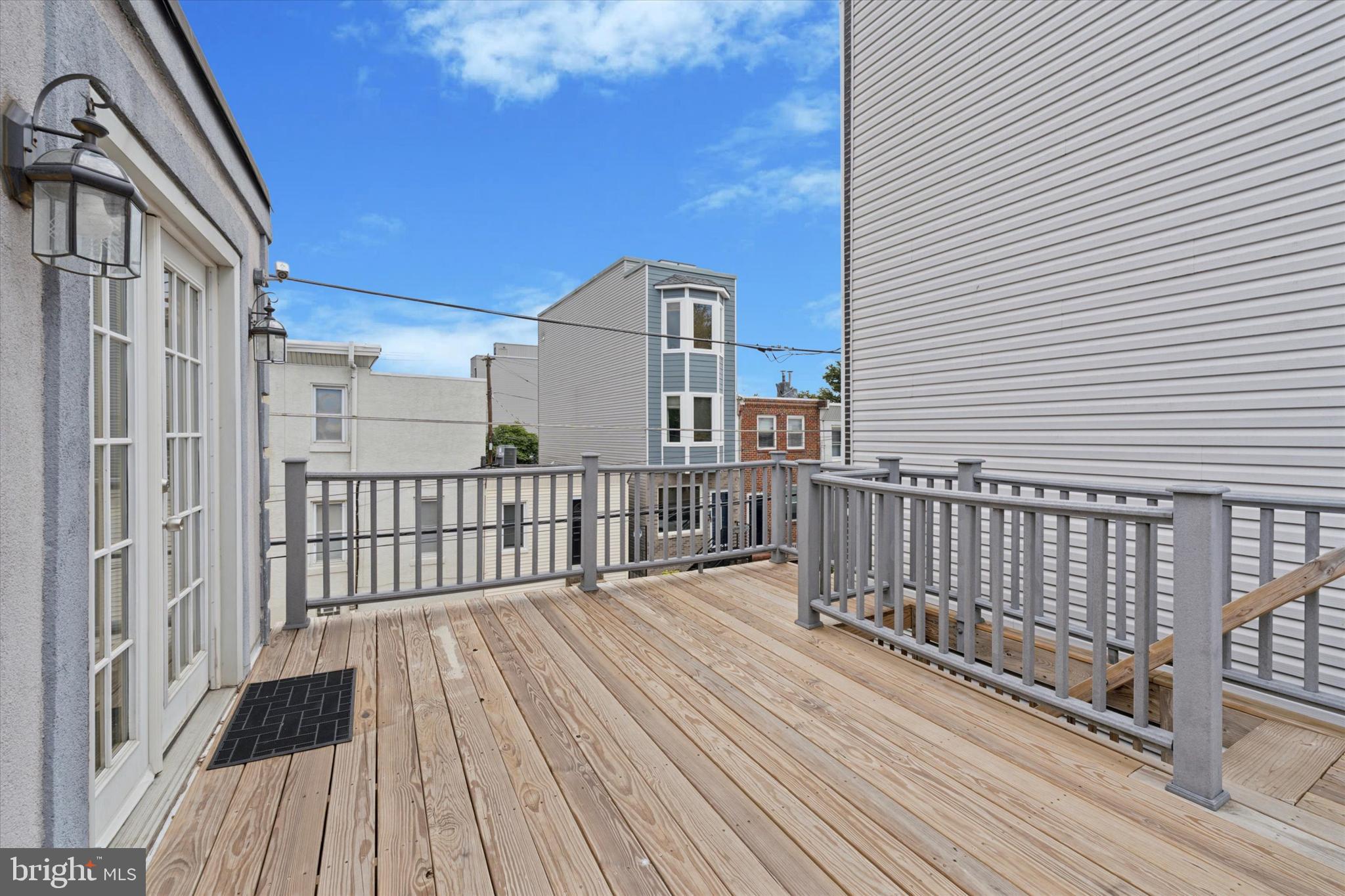 2621 Sepviva Street Philadelphia, PA 19125 - Photo 9 of 26 a view of a balcony with wooden floor