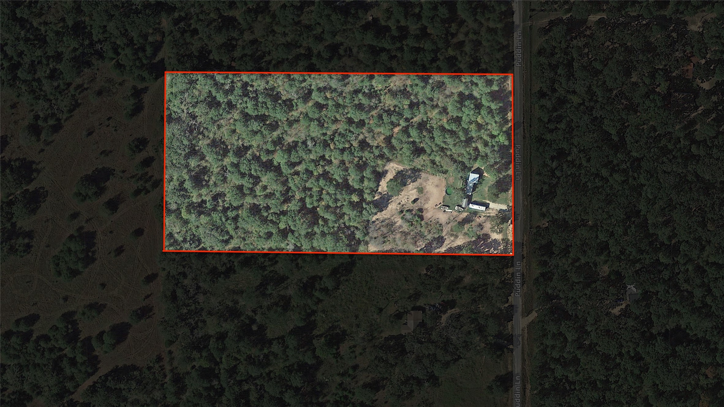 9486 Puddin Lane Madisonville, TX 77864 - Photo 7 of 16 a view of a yard