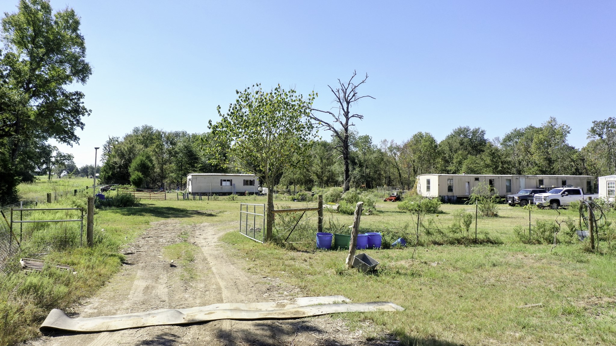 9486 Puddin Lane Madisonville, TX 77864 - Photo 8 of 16 a view of a swimming pool with a patio