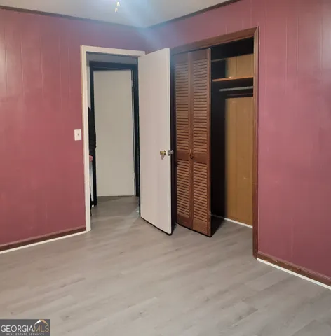an empty room with closet