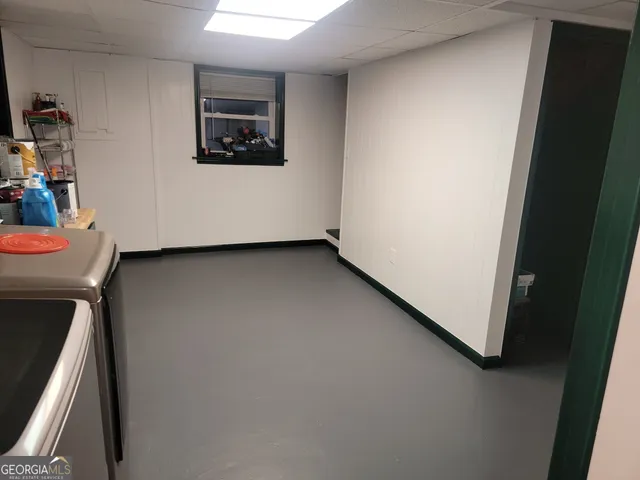 a view of a hallway with workspace