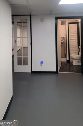 a view of a window in an empty room