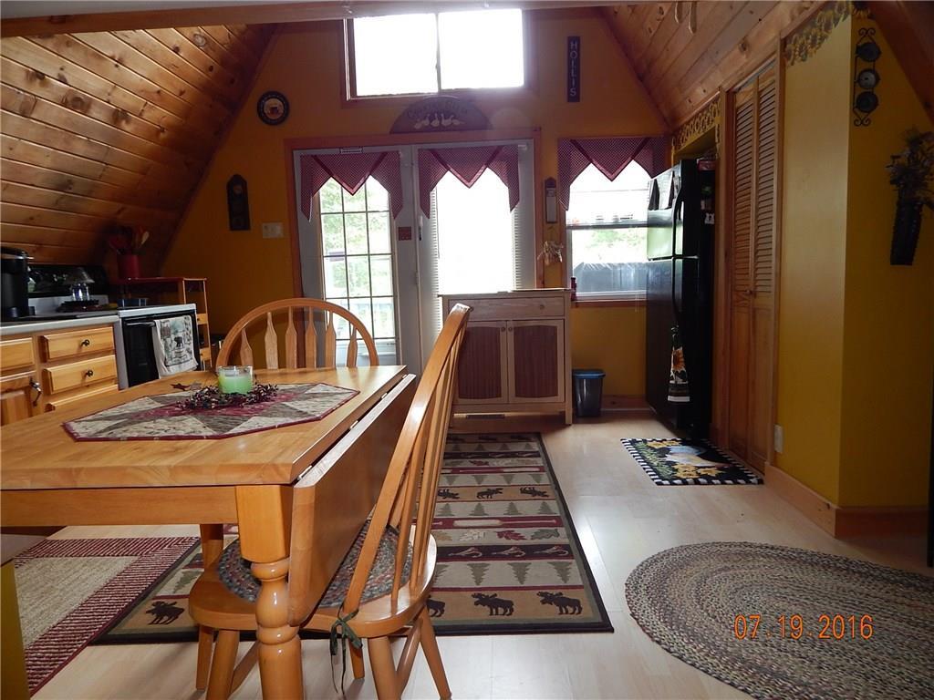 45 Hemlock Cove Road Hollis, ME 04042 - Photo 11 of 24 Enter kitchen from the deck. Pantry...