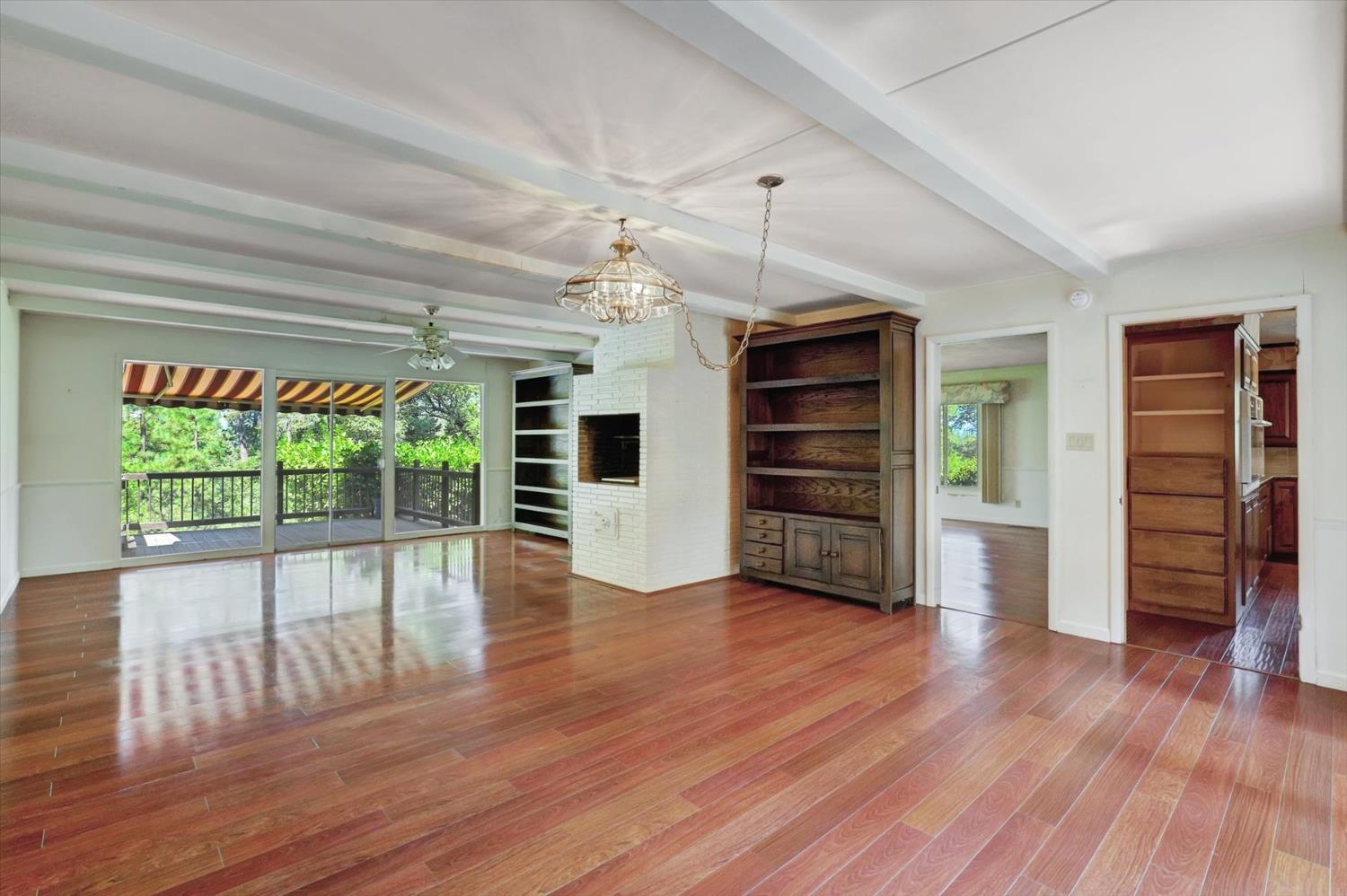 10124 South Ponderosa Way Rough and Ready, CA 95975 - Photo 11 of 63 an empty room with wooden floor closet and windows