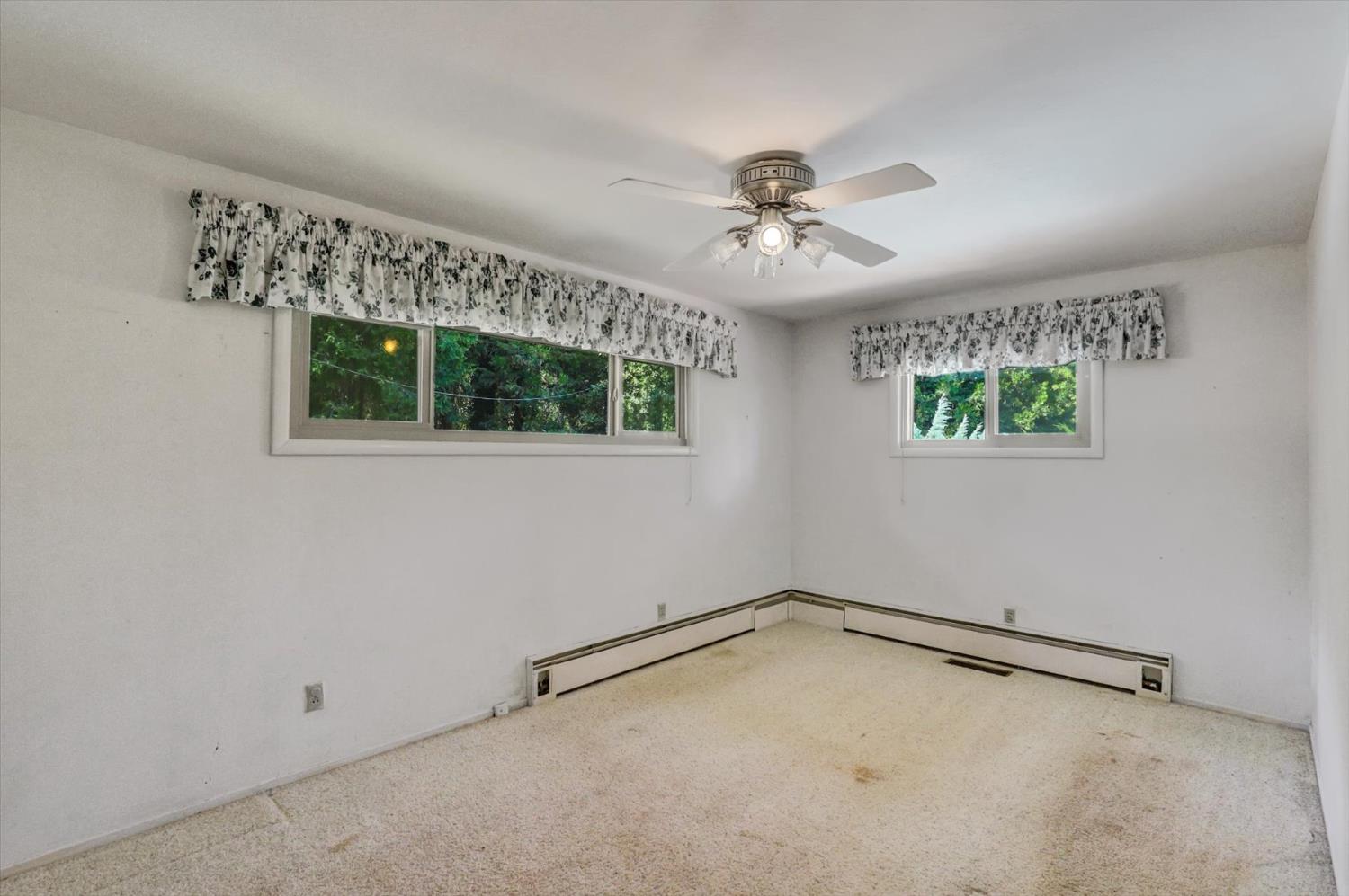 10124 South Ponderosa Way Rough and Ready, CA 95975 - Photo 17 of 63 a view of an empty room with a window