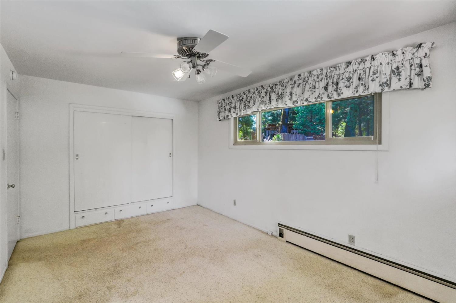 10124 South Ponderosa Way Rough and Ready, CA 95975 - Photo 18 of 63 a view of an empty room with a window