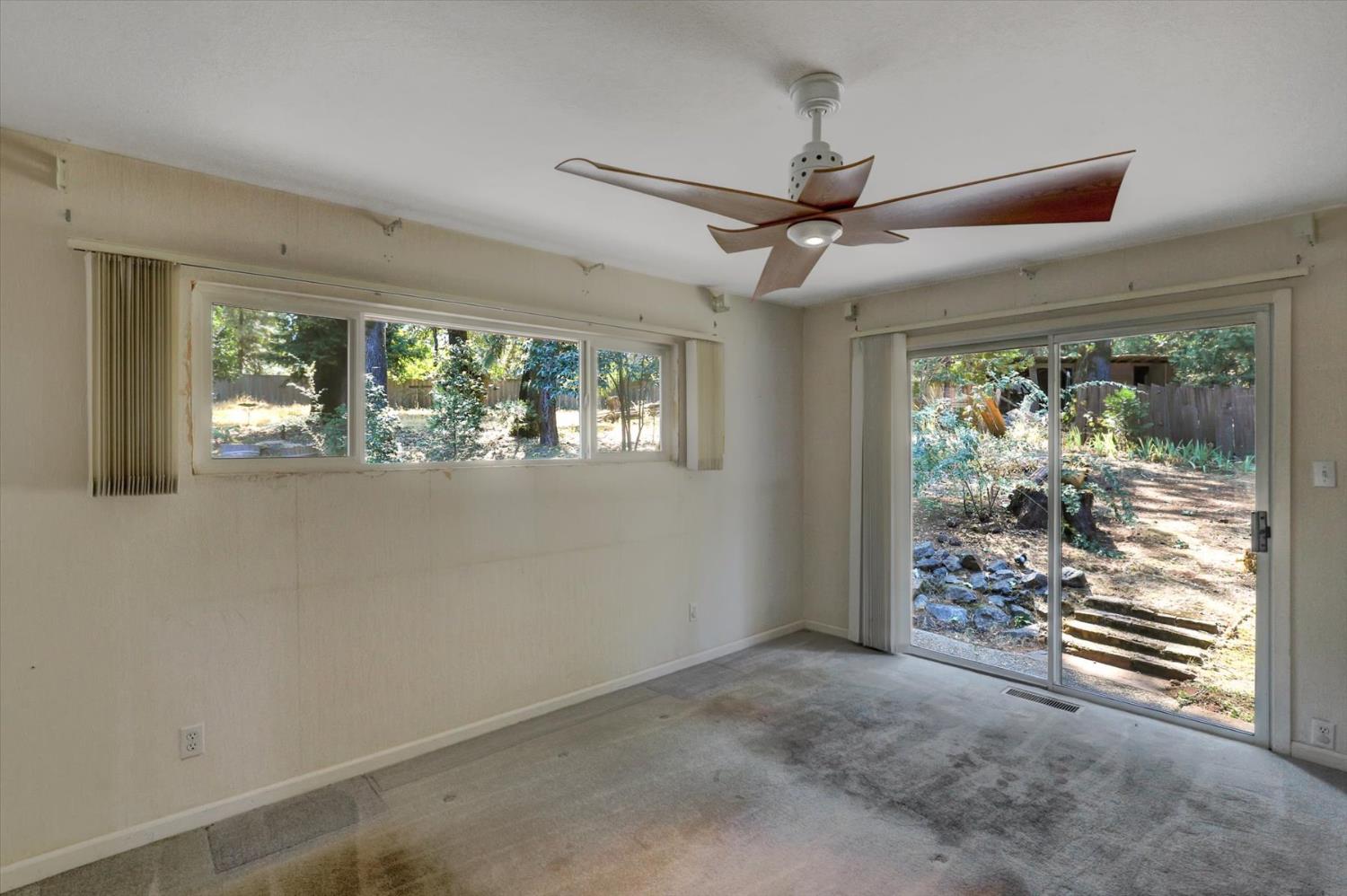10124 South Ponderosa Way Rough and Ready, CA 95975 - Photo 22 of 63 en empty room with windows