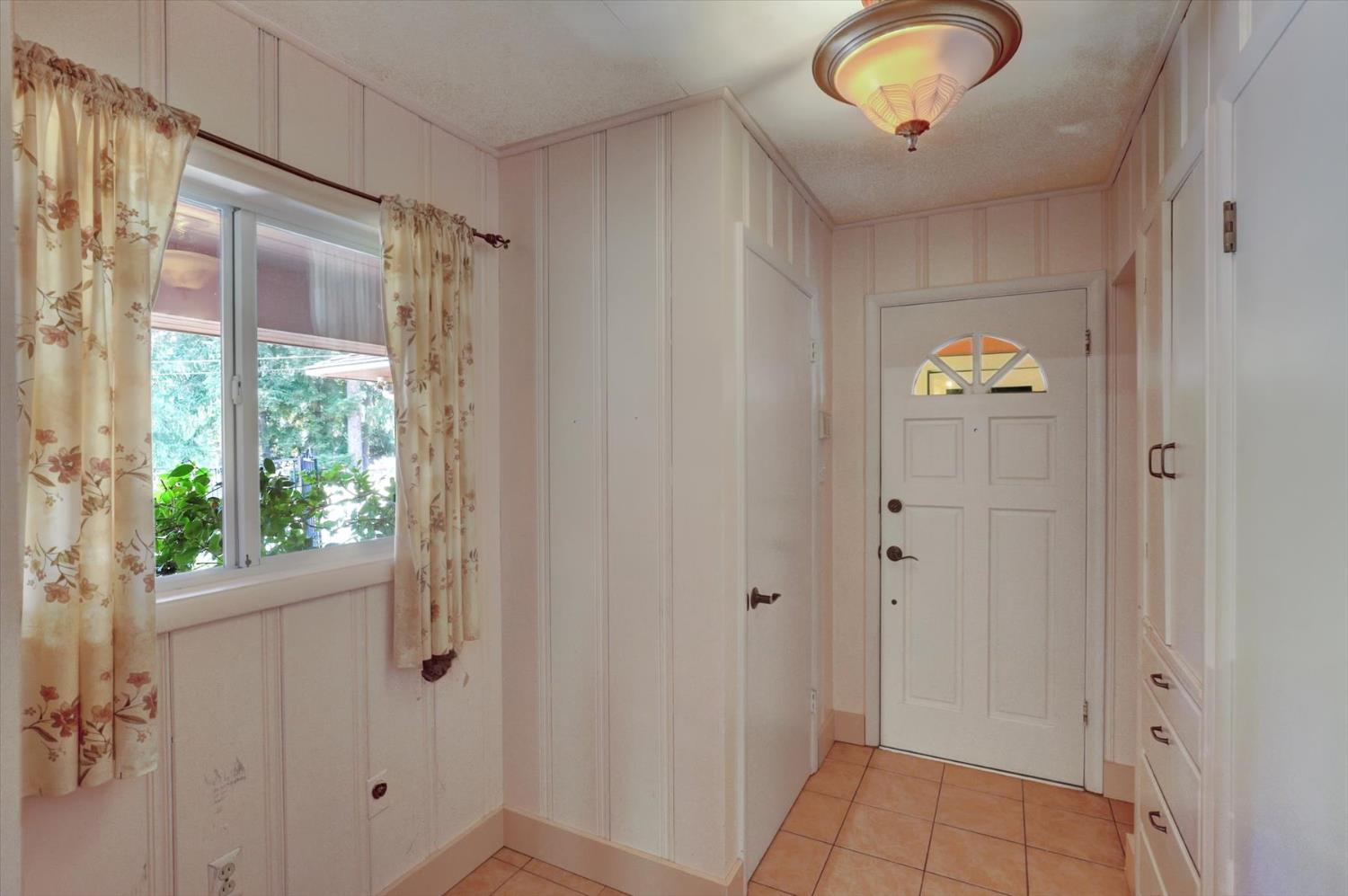 10124 South Ponderosa Way Rough and Ready, CA 95975 - Photo 26 of 63 a view of an entryway with wooden floor