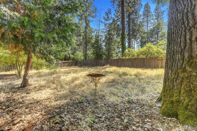 a view of an empty room with a staircase