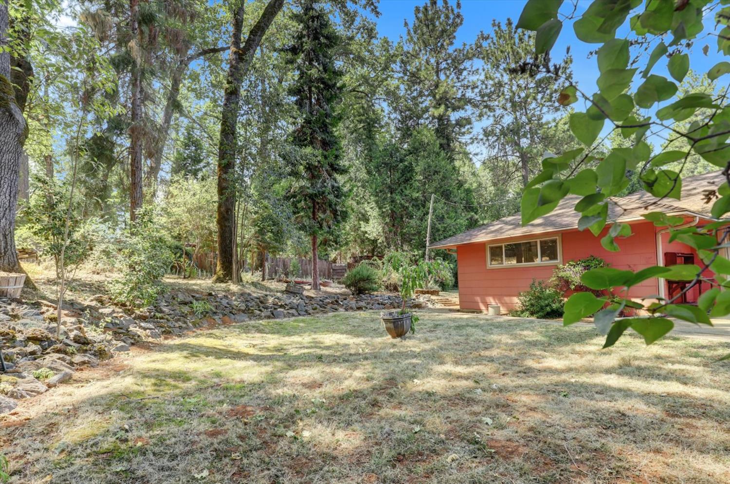 10124 South Ponderosa Way Rough and Ready, CA 95975 - Photo 46 of 63 a view of a house with a yard
