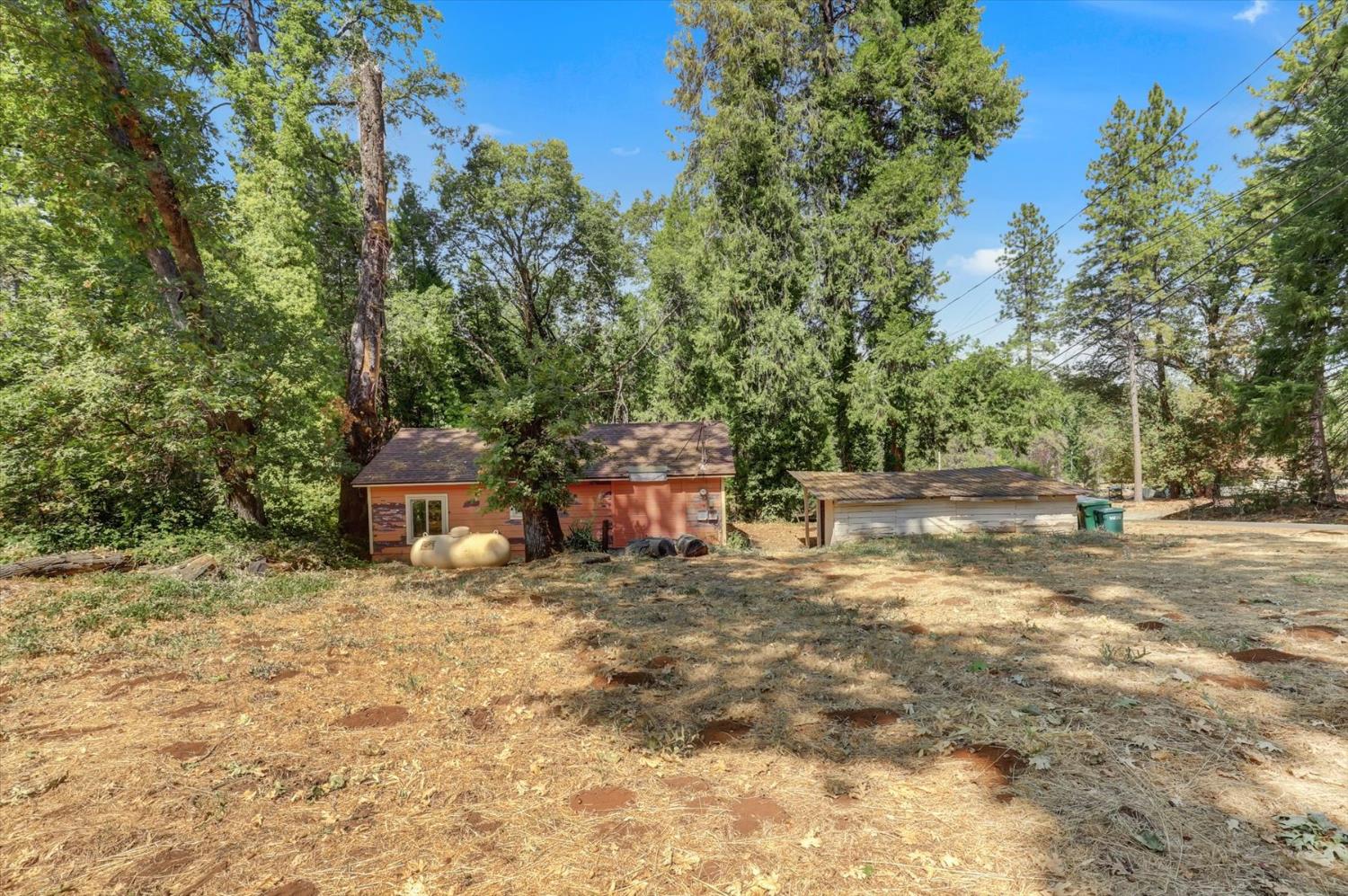 10124 South Ponderosa Way Rough and Ready, CA 95975 - Photo 59 of 63 a view of a house with a yard