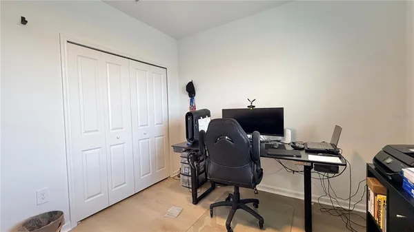 a view of workspace with lounge chair