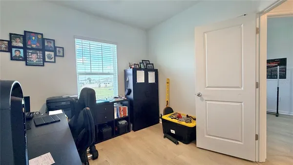 a room with furniture and a window