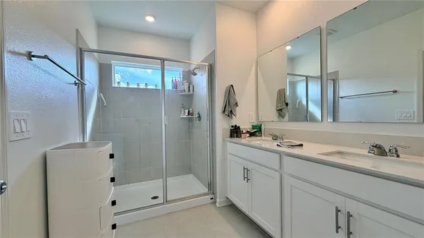 a room with a white wall and closet