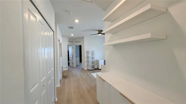 a bathroom with a double vanity sink mirror and double
