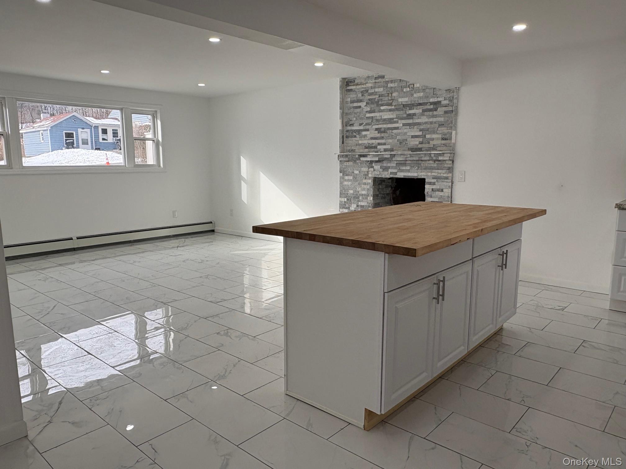 a kitchen with a sink cabinets and utility