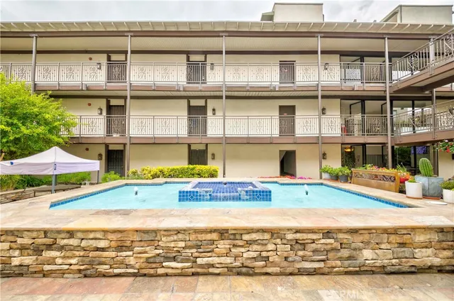 a view of an buildings with swimming pool