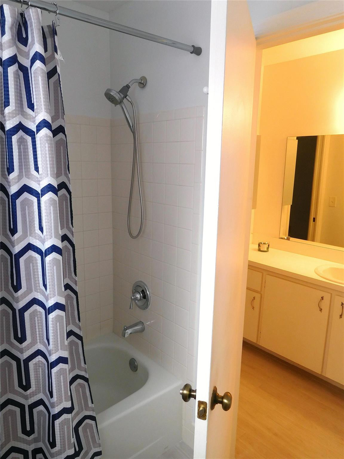 23140 Southwest 55th Avenue Boca Raton, FL 33433 - Photo 16 of 39 a bathroom with a bathtub and a shower