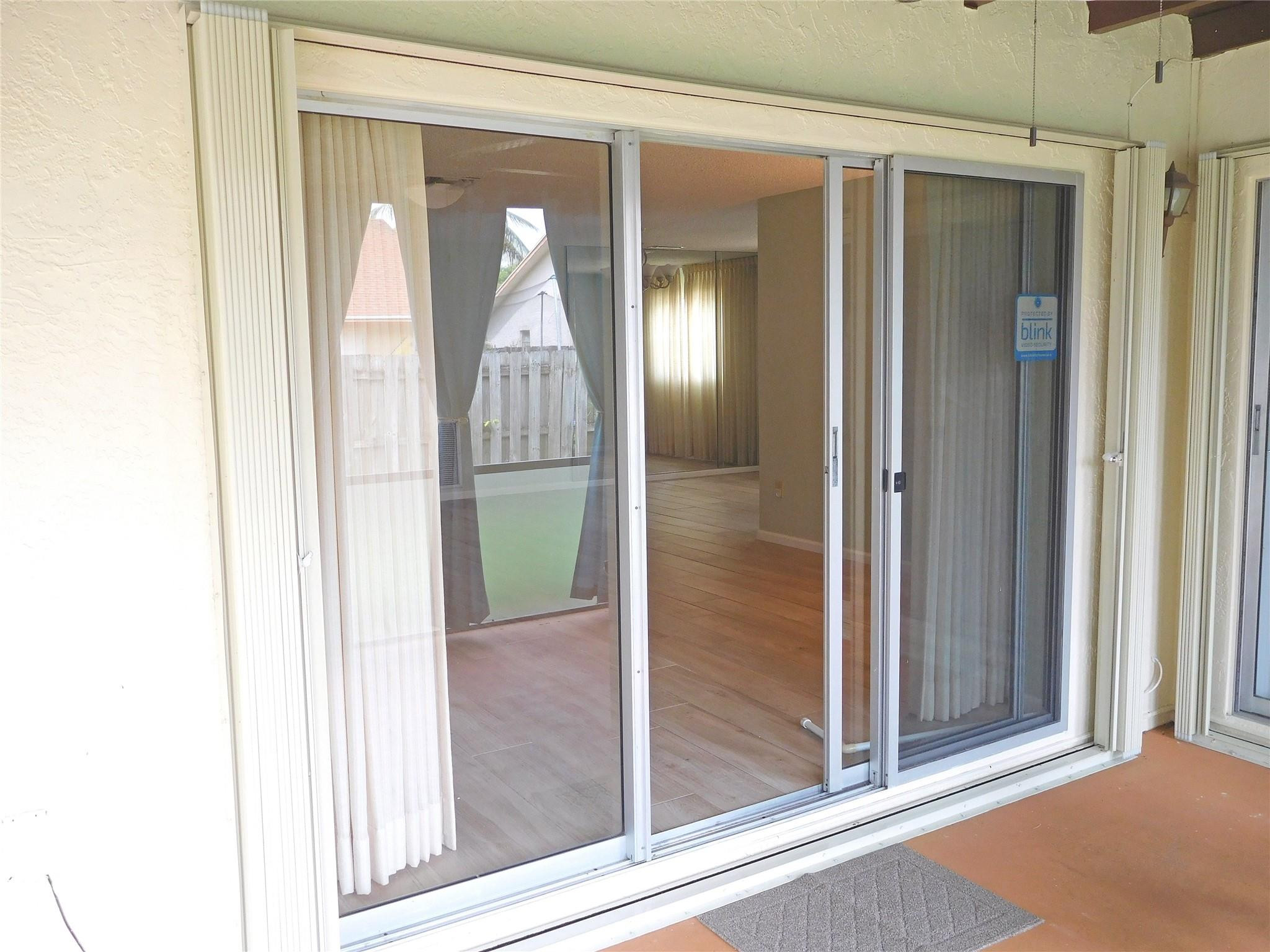 23140 Southwest 55th Avenue Boca Raton, FL 33433 - Photo 24 of 39 a view of a bathroom with glass door and glass door