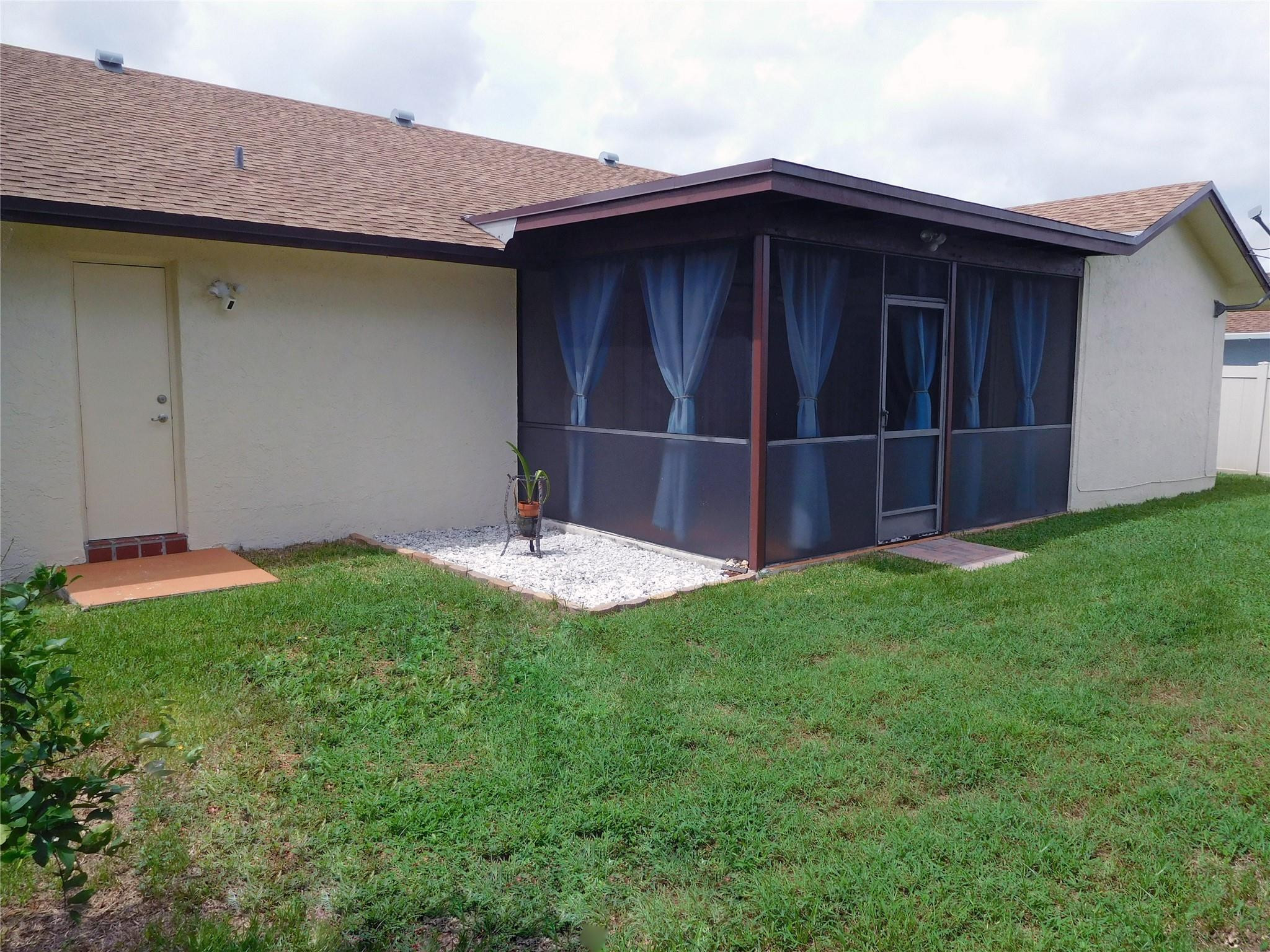 23140 Southwest 55th Avenue Boca Raton, FL 33433 - Photo 7 of 39 a view of outdoor space and garden