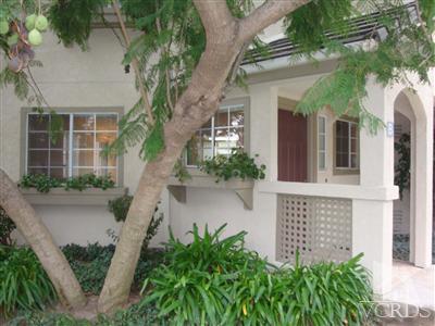 1031 Waltham Road, Unit B Simi Valley, CA 93065 - Photo 22 of 24 a front view of a house with garden
