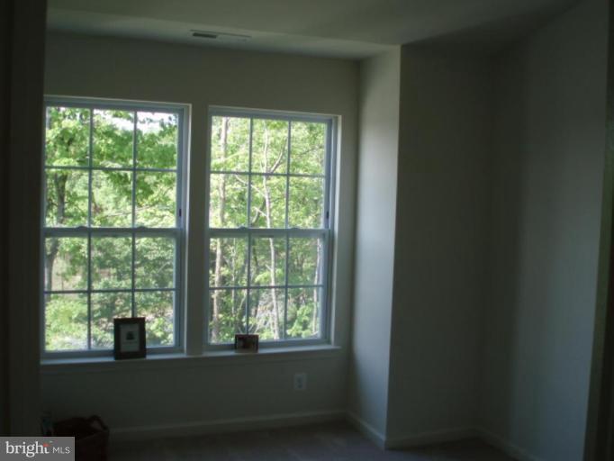 8170 Mission Road Jessup, MD 20794 - Photo 4 of 12 a view of a room that has a window
