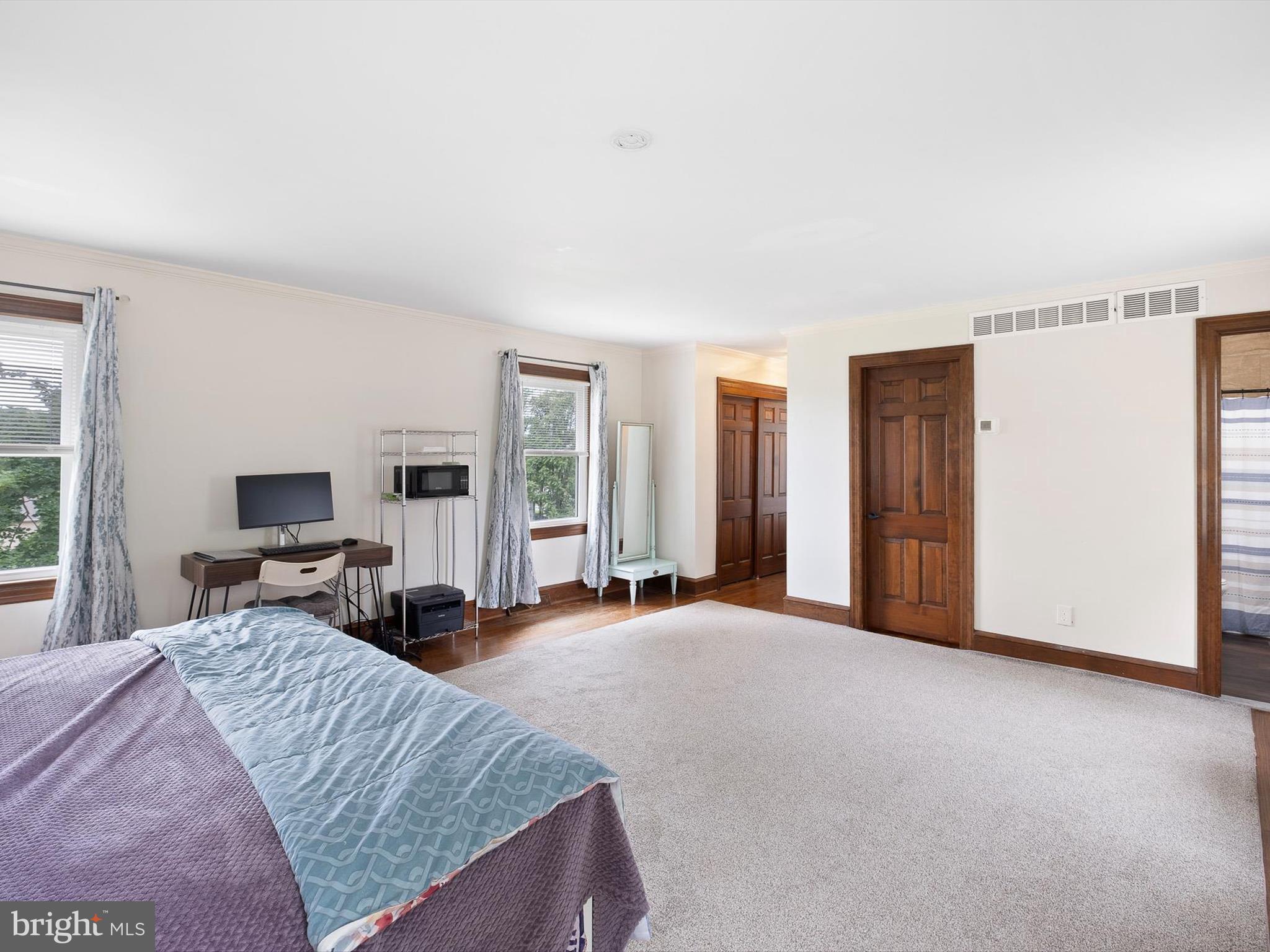 5961 Limestone Road Hockessin, DE 19707 - Photo 20 of 40 a bed room with a bed and a tv