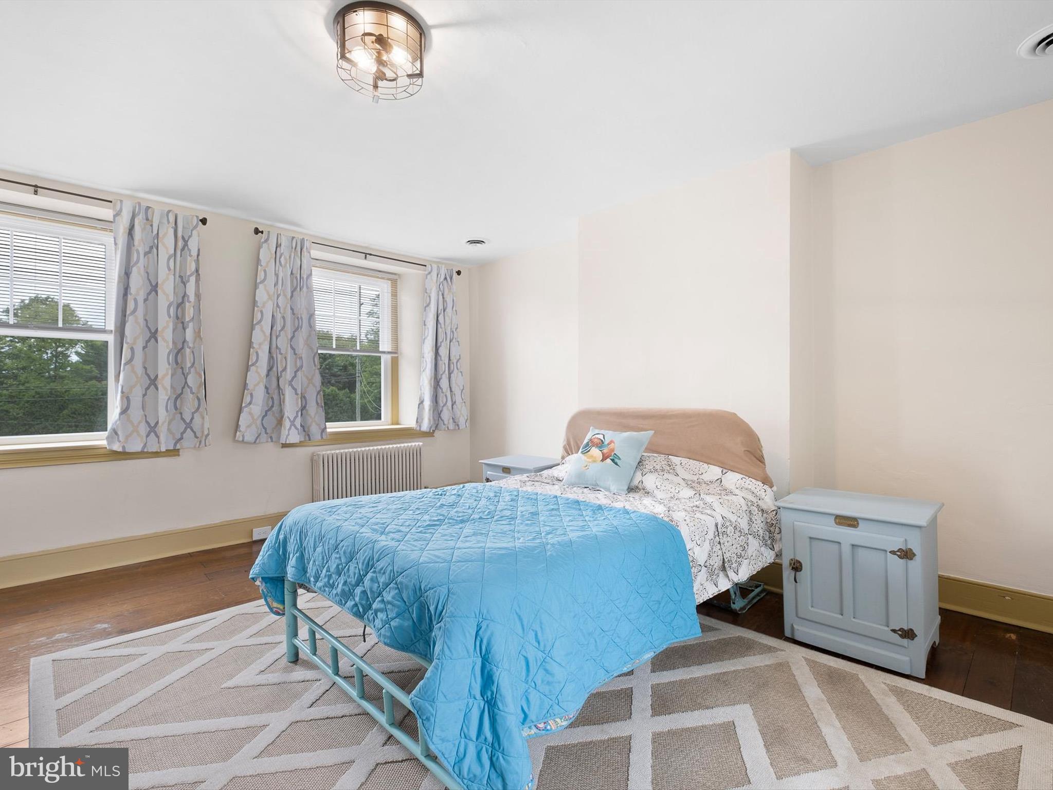 5961 Limestone Road Hockessin, DE 19707 - Photo 22 of 40 a bedroom with a bed and a window