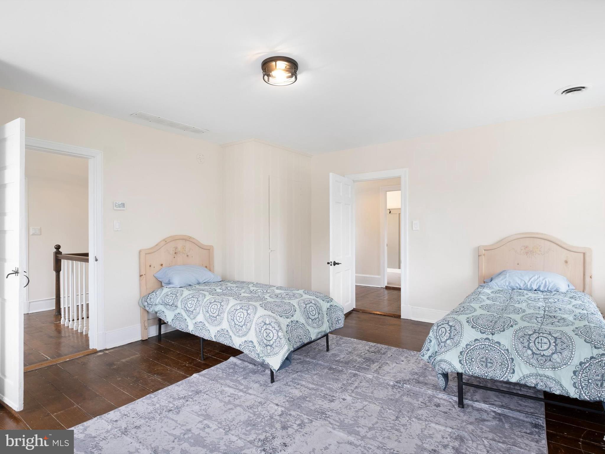 5961 Limestone Road Hockessin, DE 19707 - Photo 26 of 40 a bedroom with a bed and dresser