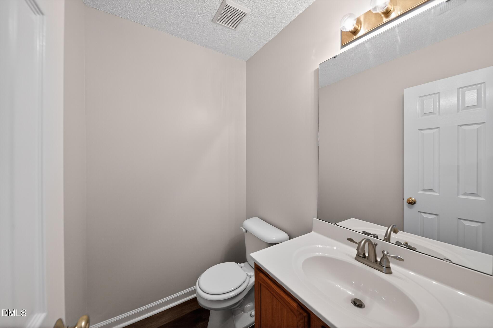 2654 Dwight Place Raleigh, NC 27610 - Photo 6 of 13 2654_Dwight_Pl-Bathroom-8057