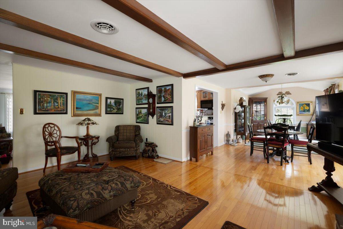 1049 Laurel Grove Road Winchester, VA 22602 - Photo 13 of 42 a living room with furniture and wooden floor