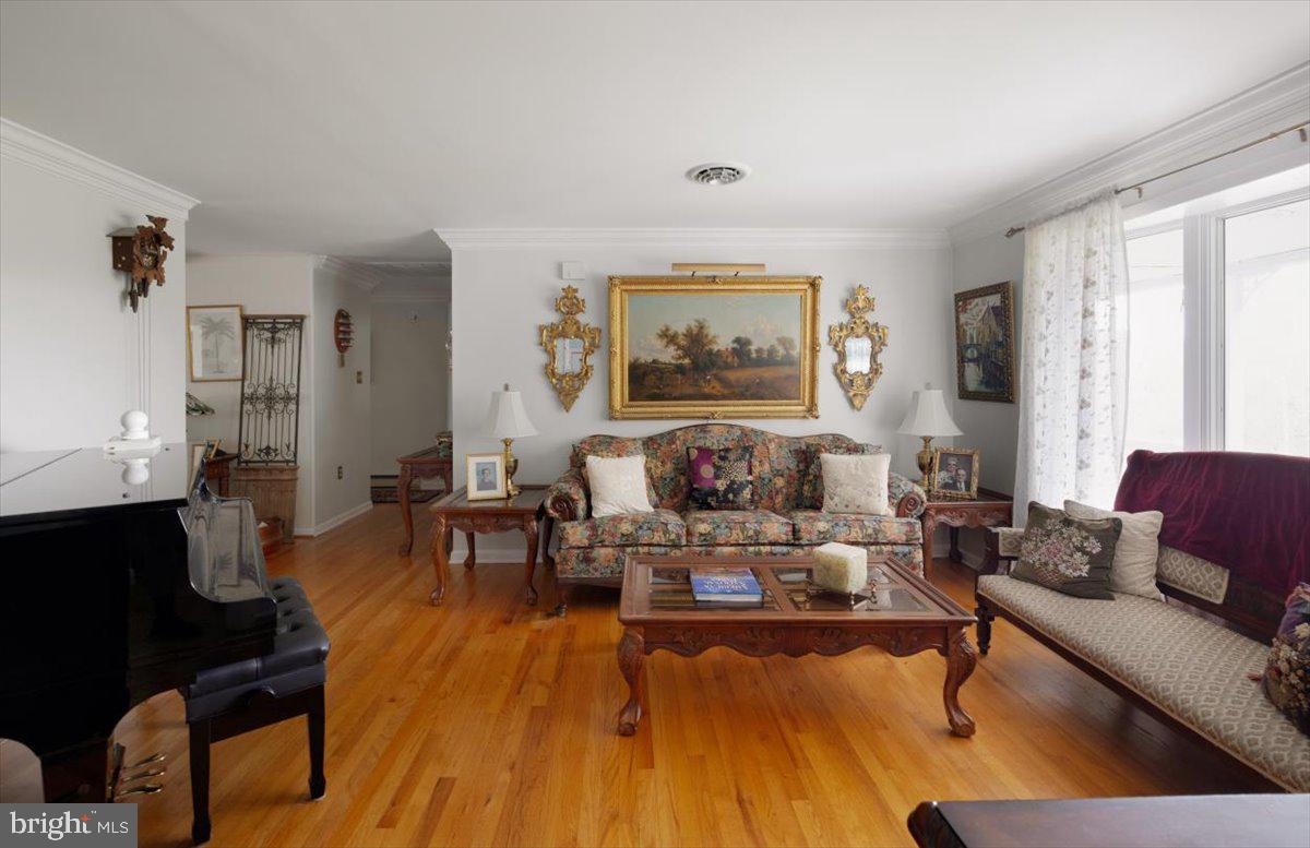1049 Laurel Grove Road Winchester, VA 22602 - Photo 15 of 42 a living room with furniture and wooden floor