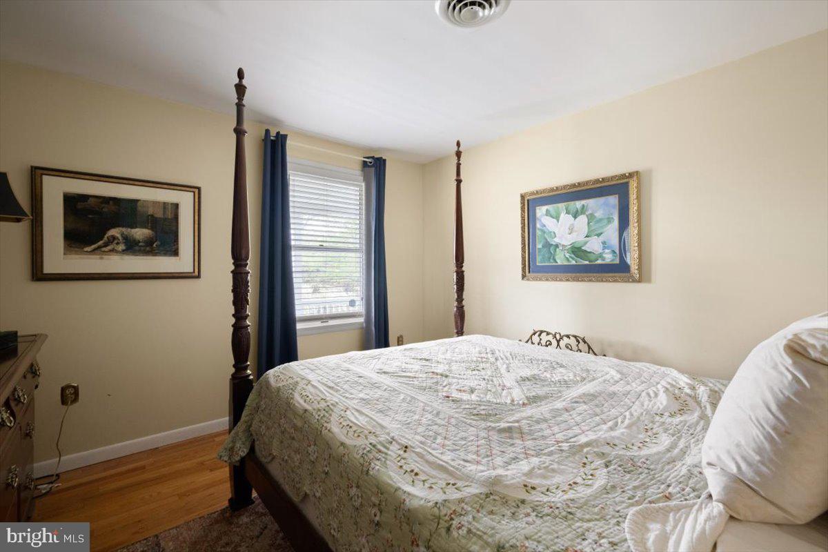 1049 Laurel Grove Road Winchester, VA 22602 - Photo 17 of 39 a bedroom with a bed and a window