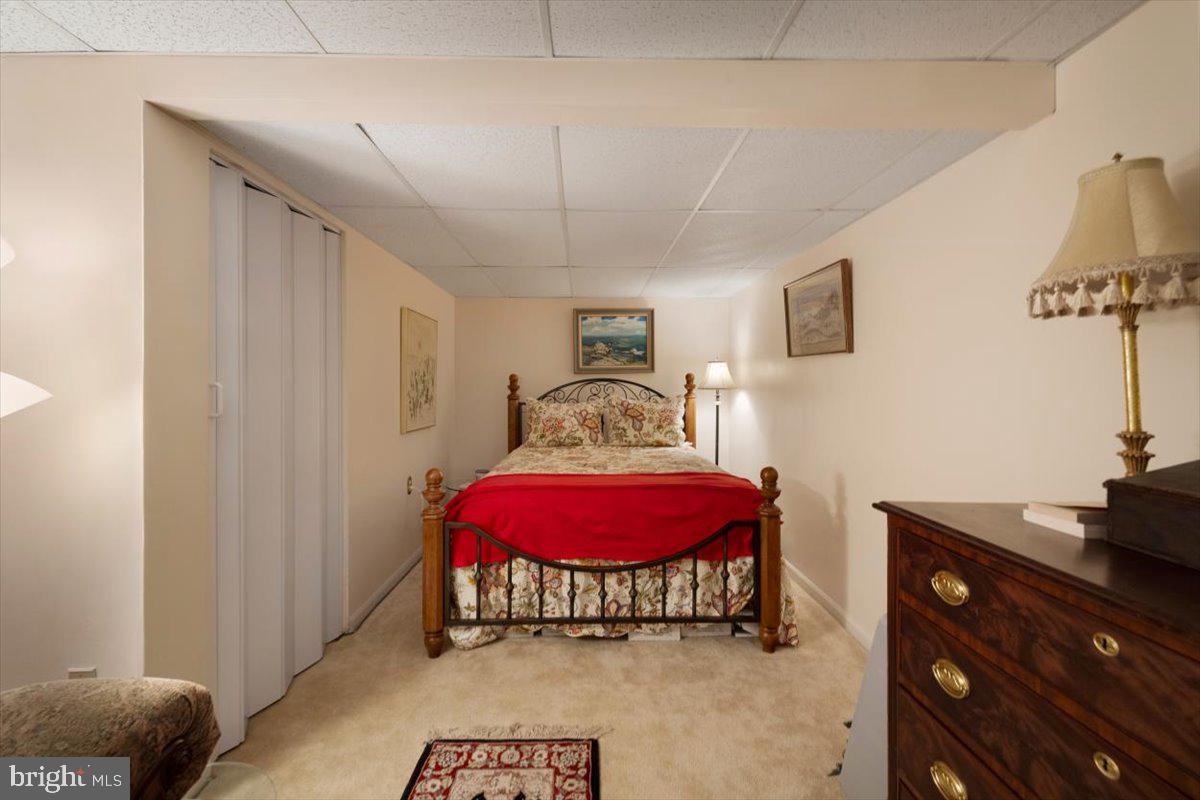 1049 Laurel Grove Road Winchester, VA 22602 - Photo 21 of 39 a bedroom with furniture and a bed