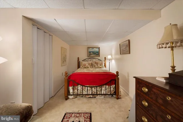 a bedroom with furniture and a bed