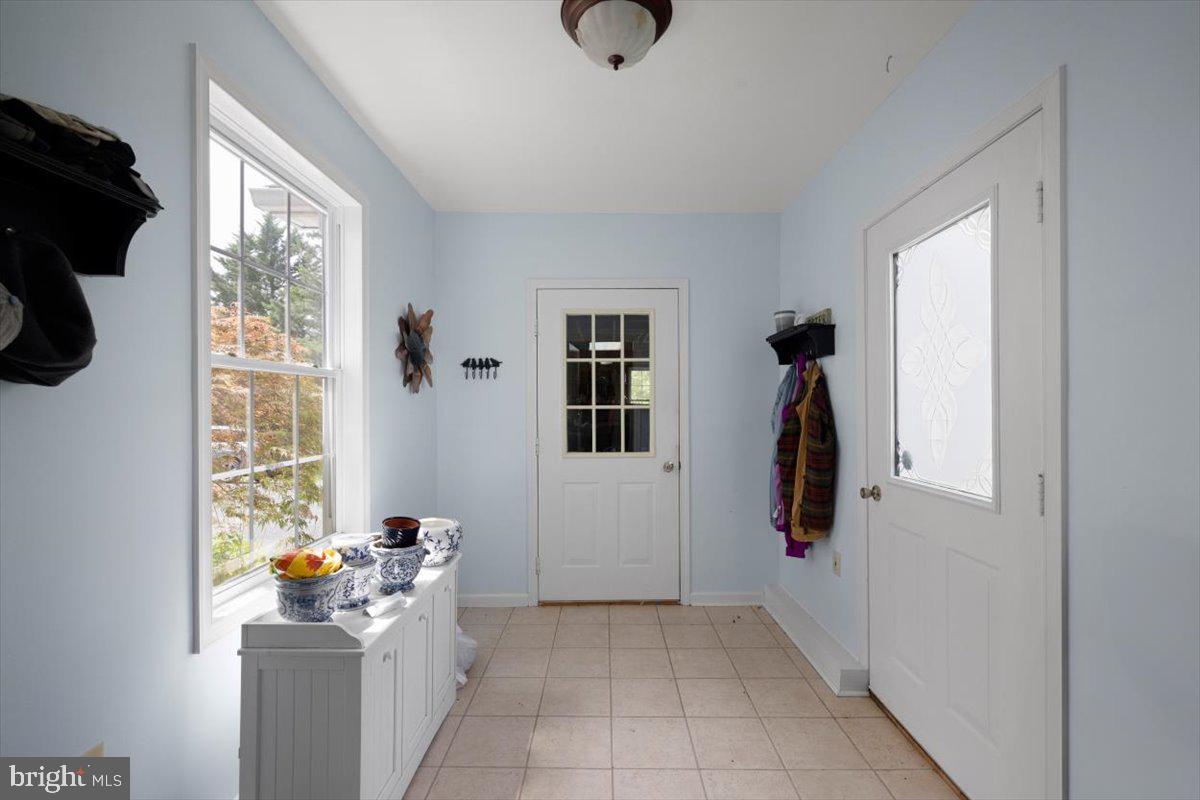 1049 Laurel Grove Road Winchester, VA 22602 - Photo 29 of 42 a view of entryway with workspace and windows