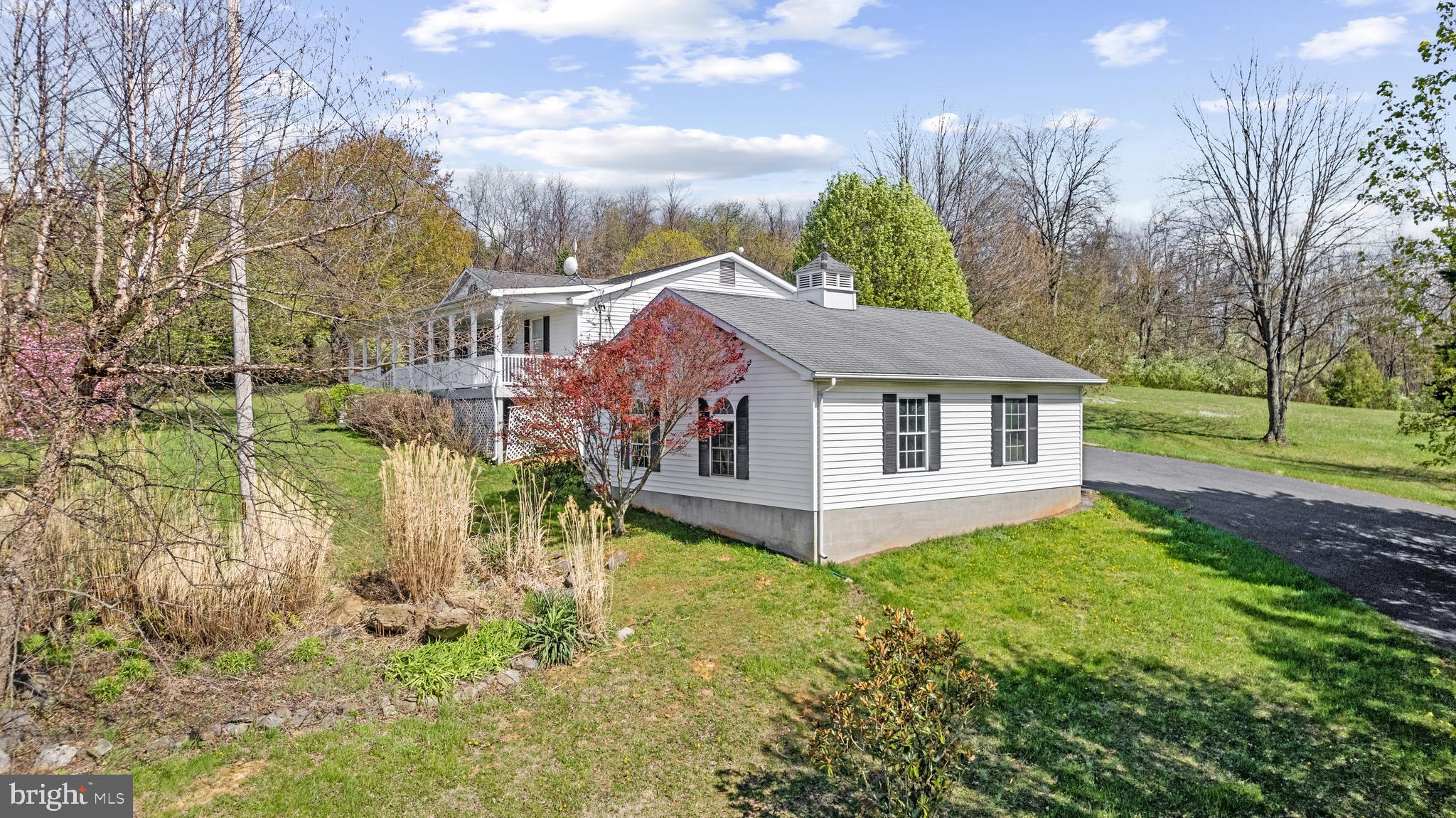 1049 Laurel Grove Road Winchester, VA 22602 - Photo 30 of 39 a view of a house with a big yard