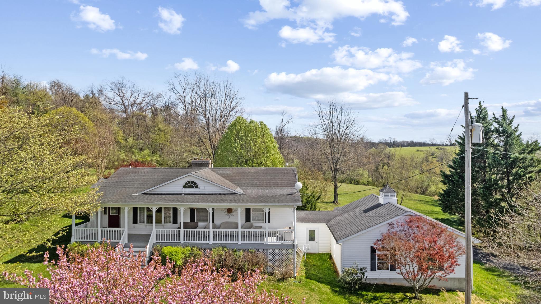 1049 Laurel Grove Road Winchester, VA 22602 - Photo 41 of 42 a aerial view of a house with a big yard and large trees