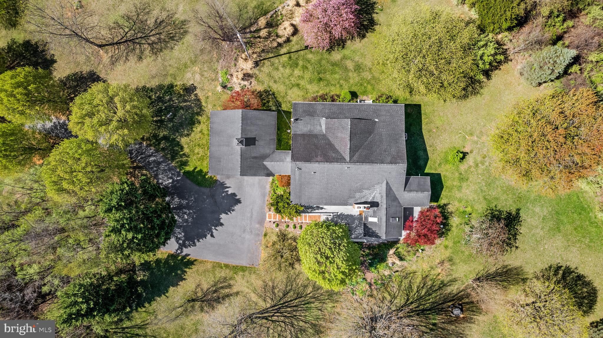 1049 Laurel Grove Road Winchester, VA 22602 - Photo 42 of 42 an aerial view of a house with a yard and garden